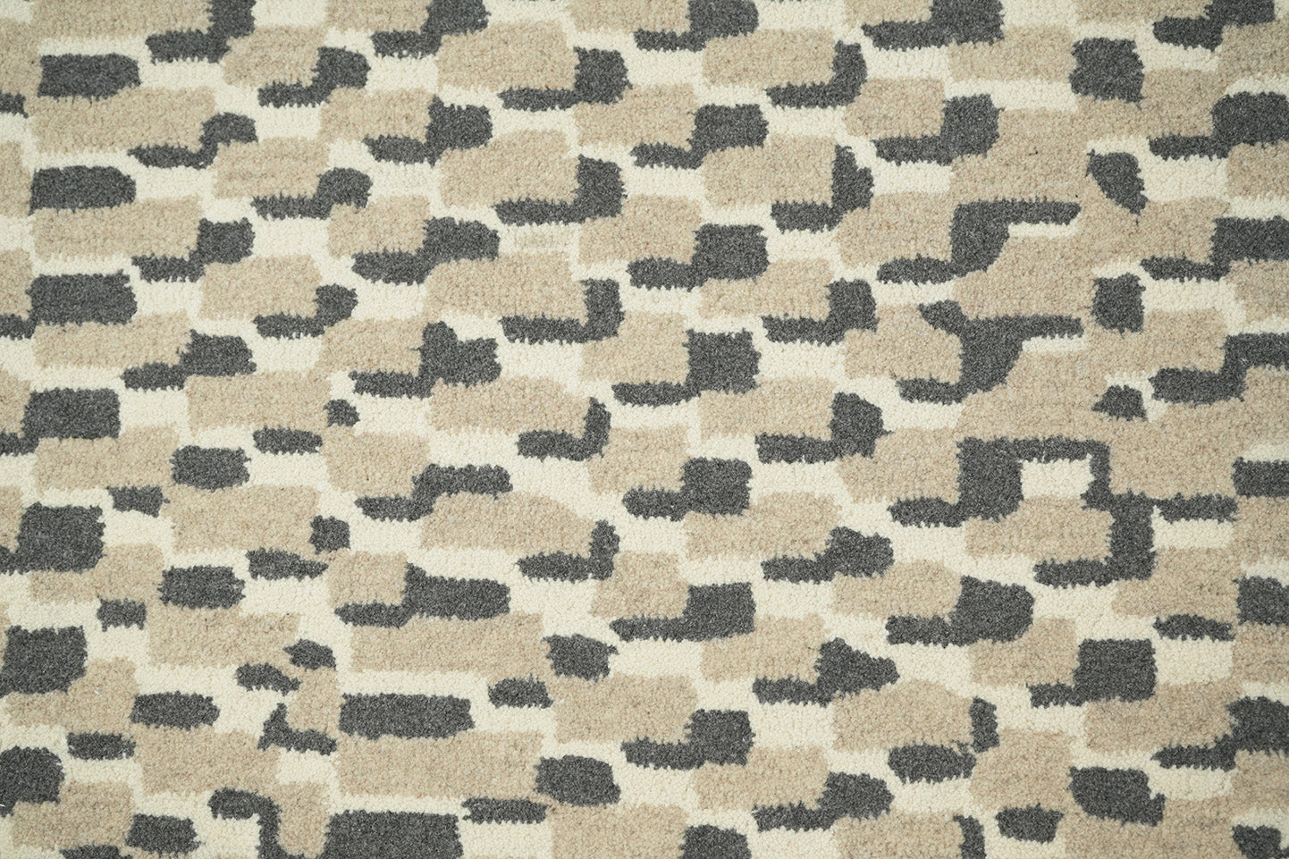 Close up of hand tufted New Zealand wool texture on Staggered Dash Wool Rug