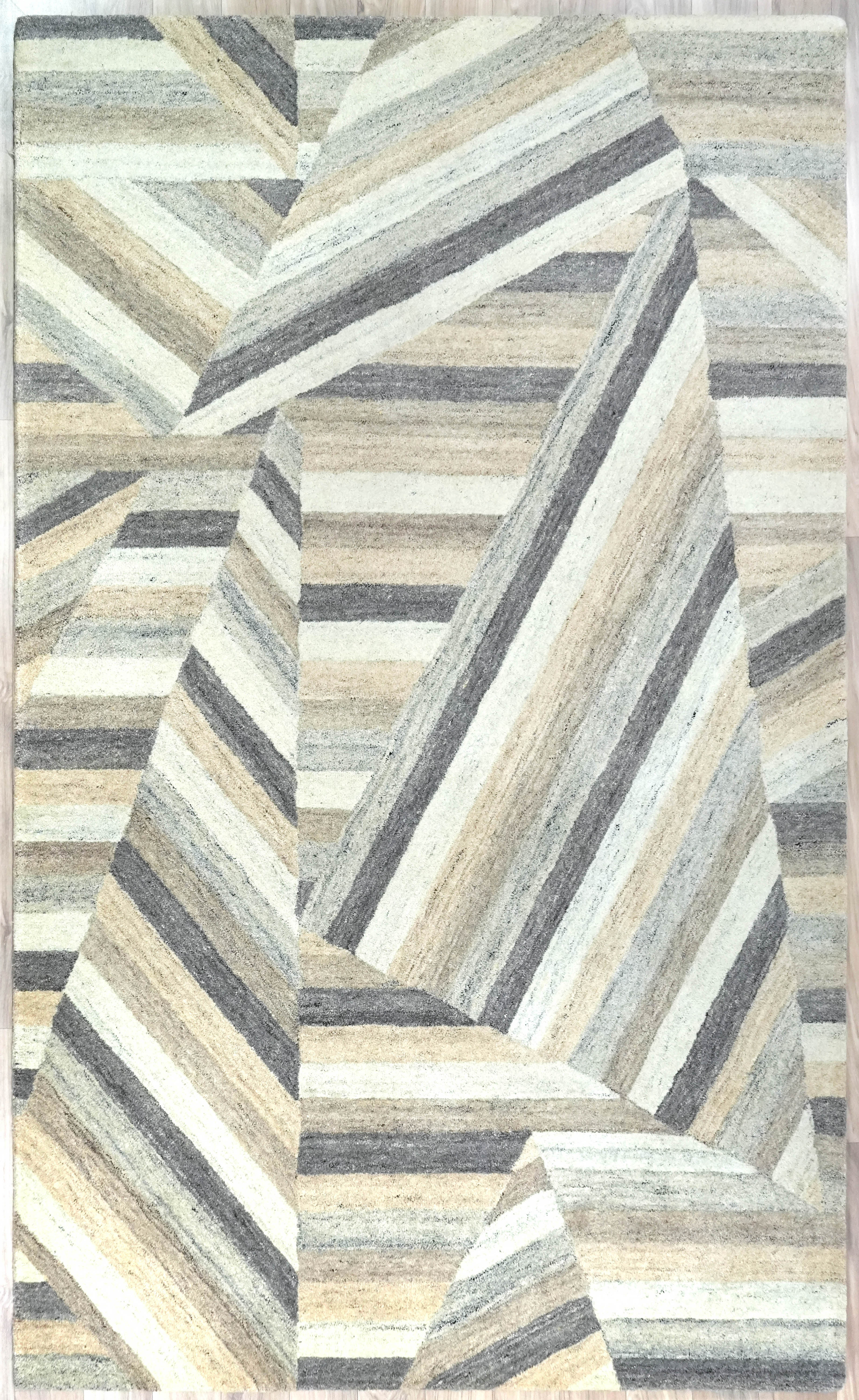 full view of Strata Shift Rug with diagonal stripe pattern in ivory beige and muted grey