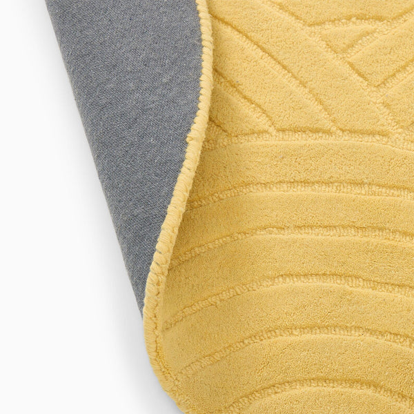 Sunrise Serenity Rug folded corner showing dense hand tufted pile and non slip backing