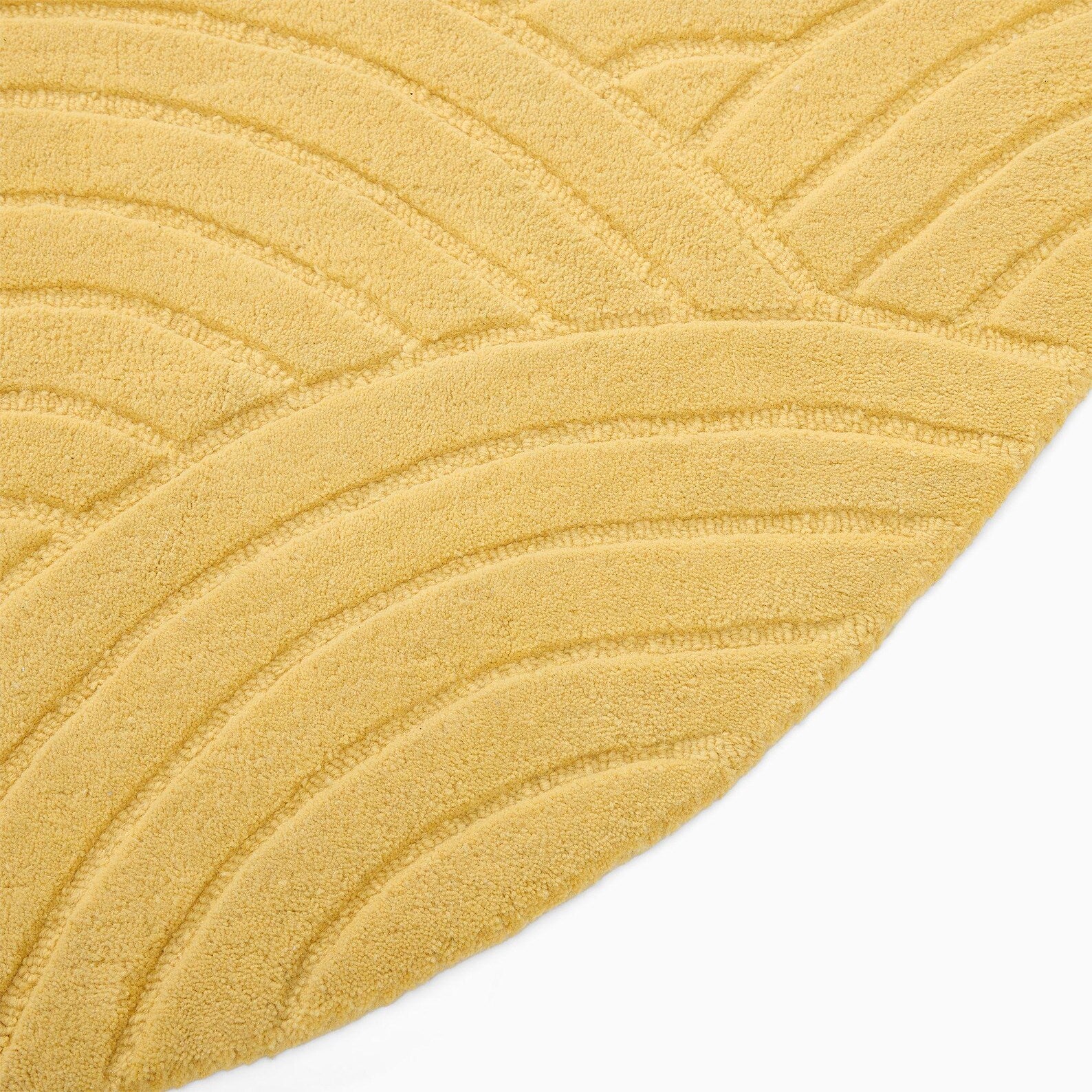 Sunrise Serenity Rug texture closeup showing sculpted sunrise pattern and smooth finish