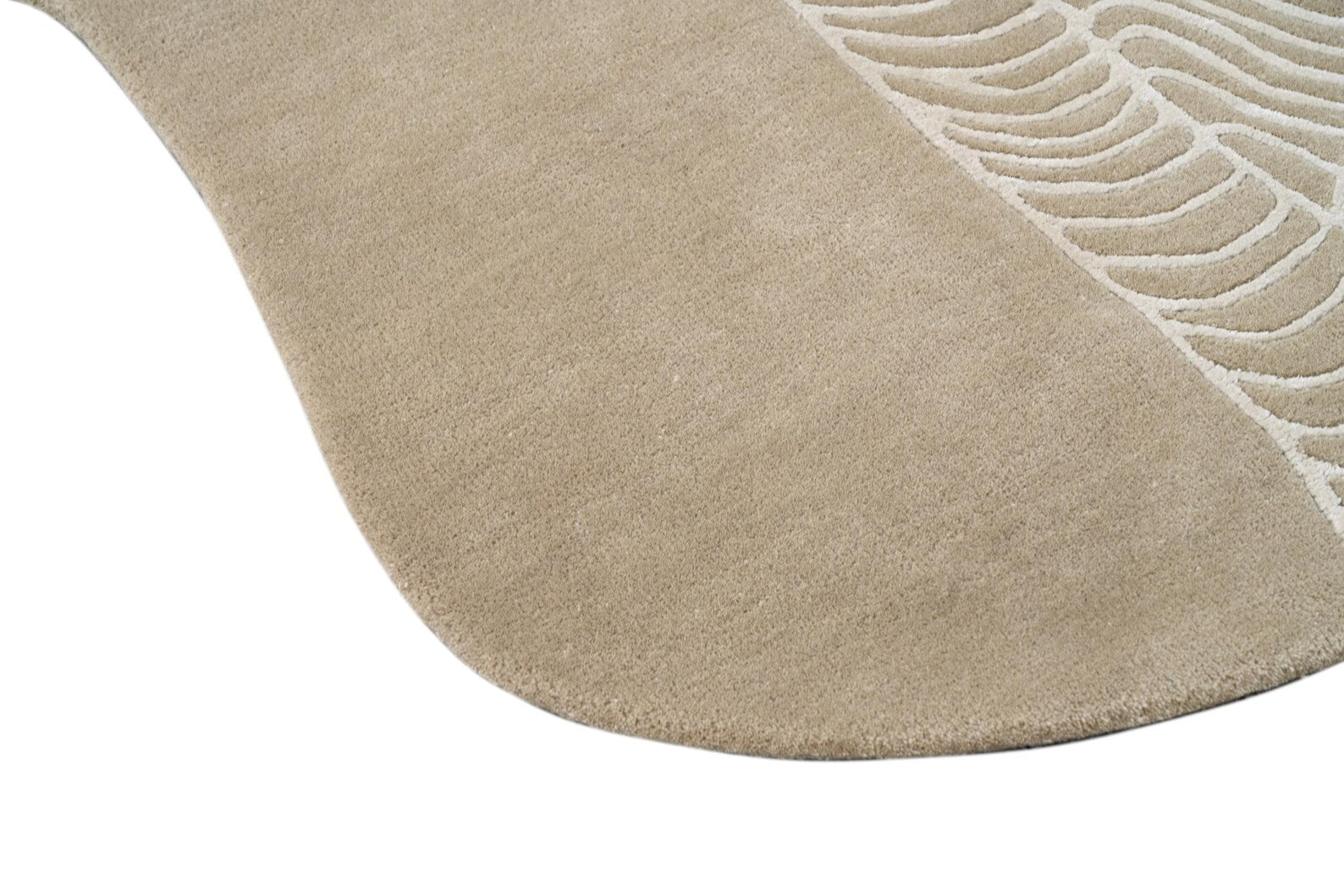 wavy abstract beige rug hand tufted rug with smooth beige section and raised flowing line pattern on the side